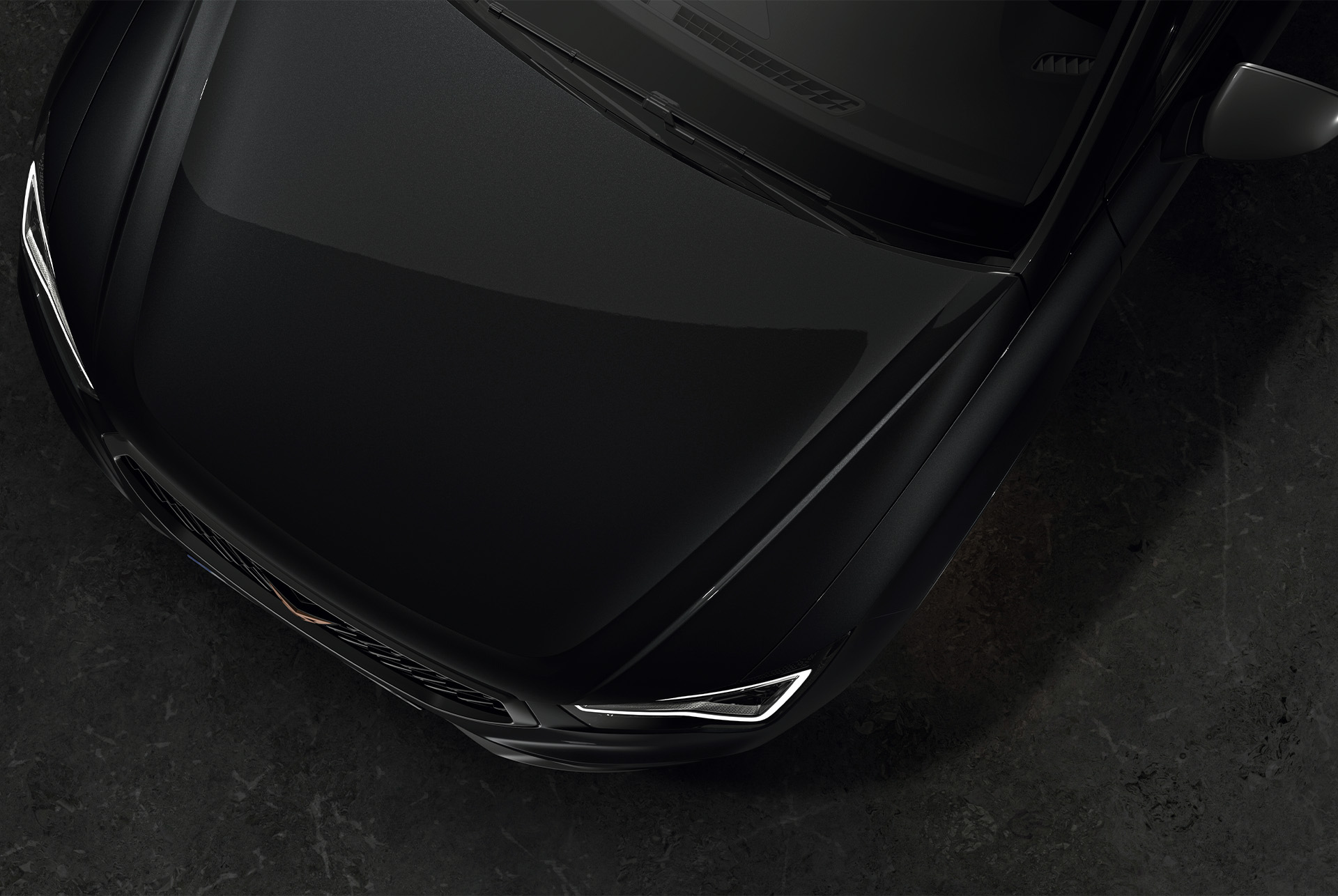 Vista superior del CUPRA Ateca en Negro Magic, donde se aprecia el color atrevido y elegante del vehículo. 