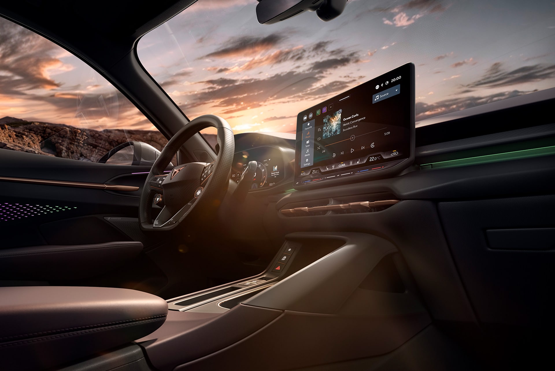 nuevo interior CUPRA Terramar con sistema de Infotainment, levas en el volante y salpicadero con acentos cobrizos.